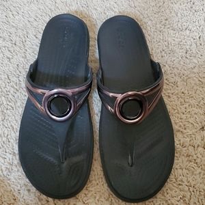 CROCS Black Sandals with Metallic Accents